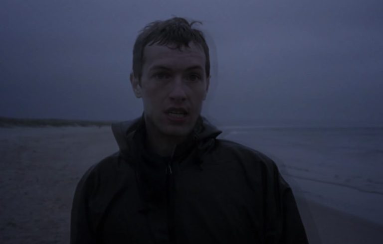 IDLES Teams Up with Chris Martin to Revamp Visuals for 'Grace' Music Video
