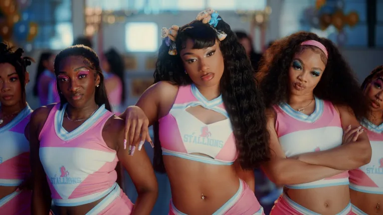 Megan Thee Stallion and Flo Milli in “Roc Steady” high school music video