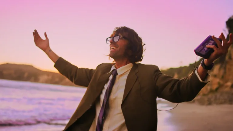 Chris Martin as Nigel dancing in “All My Love” music video