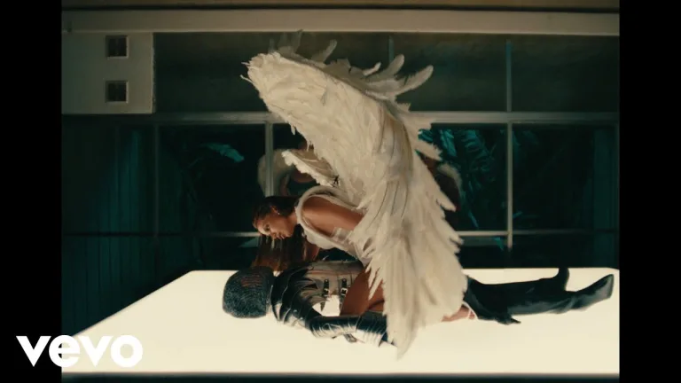 Anitta in Romeo music video wearing silver armor