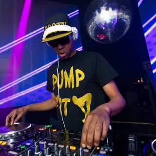 DJ Funk performing live with turntables