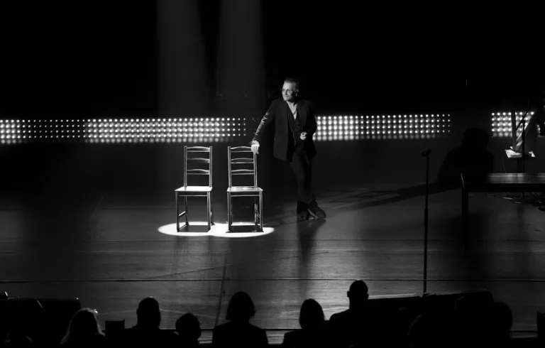 Bono performing Stories of Surrender on stage