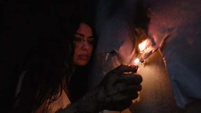 Charli XCX burns billboard in emotional “Party 4 U” music video