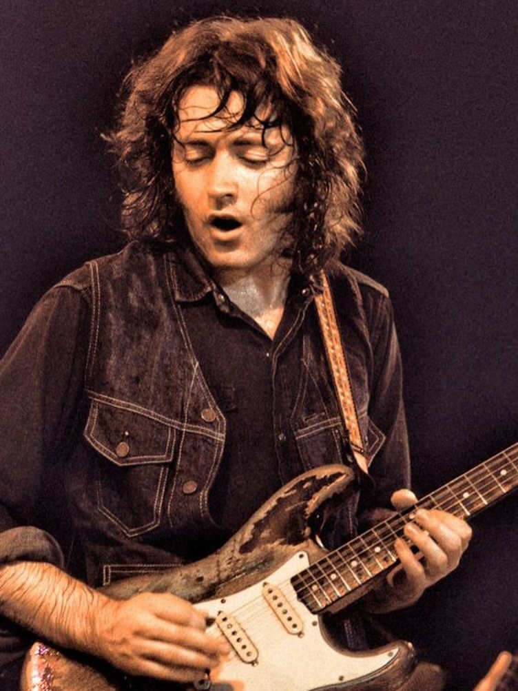 Rory Gallagher live concert performance with Stratocaster