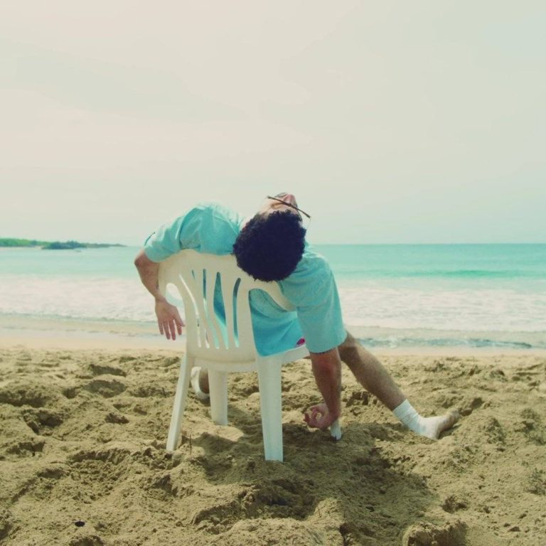 Bad Bunny playing games on the beach in the “Weltita” video