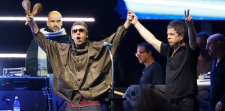 Liam and Noel Gallagher on stage at Wembley Stadium during the final UK shows of the 2025 Oasis reunion tour.