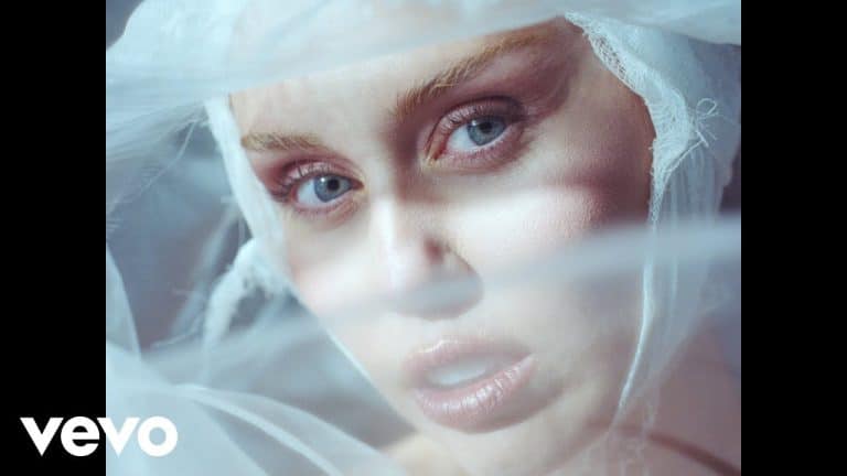 Miley Cyrus performing live in 2025
