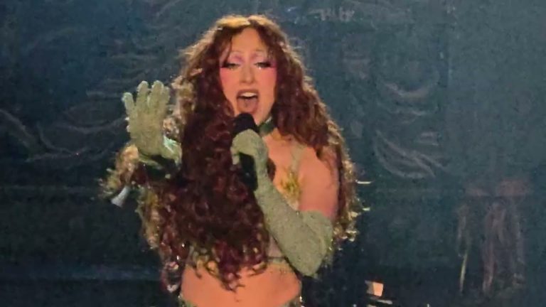 Chappell Roan in green costume performing at her Visions of Damsels tour finale in LA