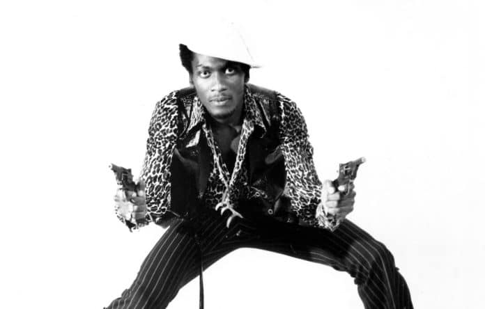 Jamaican reggae legend Jimmy Cliff performing on stage