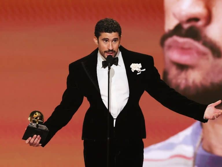 Bad Bunny holding the Album of the Year Grammy for Debí Tirar Más Fotos at the 2026 awards