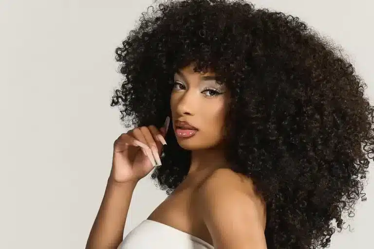 Megan Thee Stallion smiling during the official announcement for her role as Zidler in Moulin Rouge! The Musical on Broadway