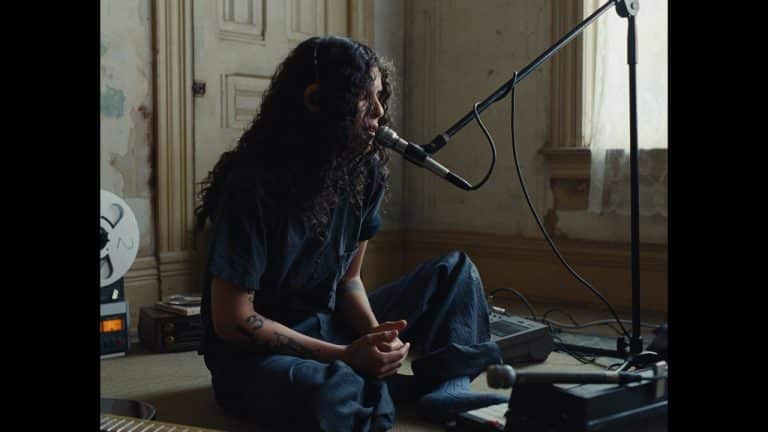 070 Shake performing an acoustic version of 'If You're Free' in a lo-fi home studio setting