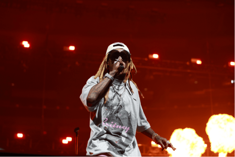 Lil Wayne performing live on stage during the Tha Carter 20th Anniversary Tour 2026.