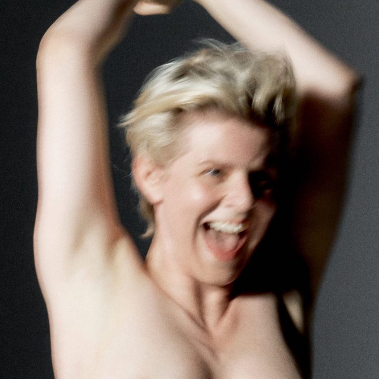 Robyn posing for the Sexistential album cover, showcasing a bold and mature aesthetic for her 2026 comeback.
