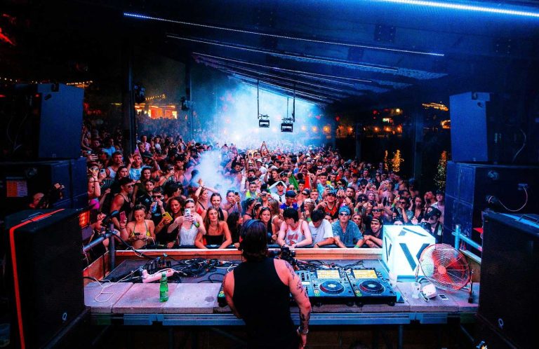 Crowd dancing at the Beach Stage during Terminal V Croatia at The Garden Resort Tisno.