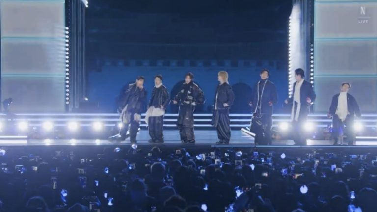 BTS performing on the frame-shaped stage during their Seoul comeback concert in March 2026, with the Arirang world tour backdrop