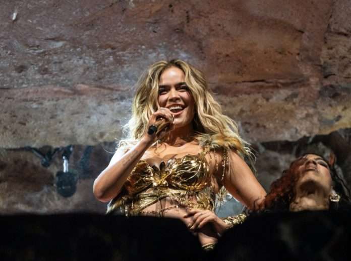 Karol G performing on the Coachella 2026 mainstage during her historic headlining set
