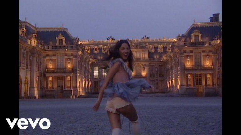 Olivia Rodrigo running through the Palace of Versailles in the Drop Dead music video directed by Petra Collins