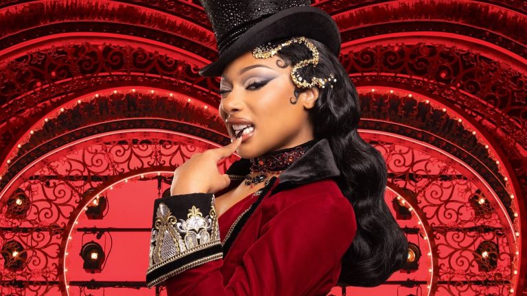 Megan Thee Stallion dressed in Harold Zidler’s iconic red velvet tuxedo jacket for her Broadway debut in Moulin Rouge! The Musical.