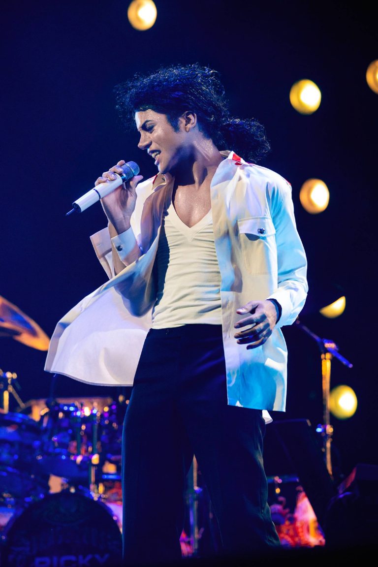 Cinematic shot from the Michael Jackson biopic Michael featuring the iconic Bad tour stage performance.