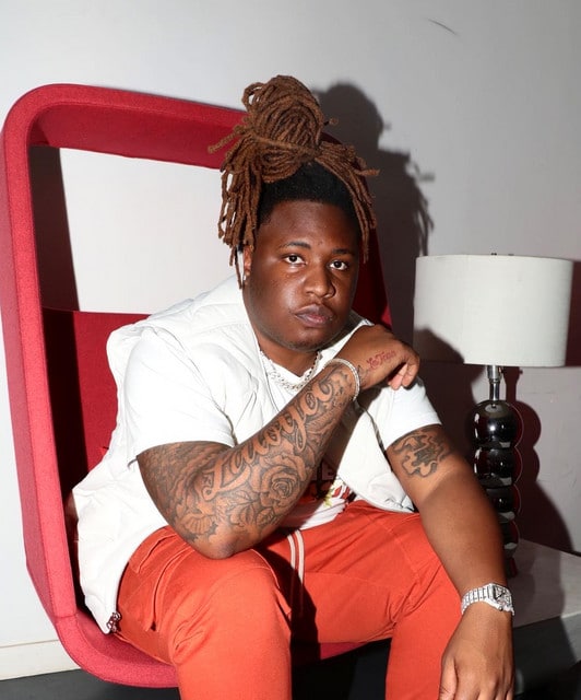 hip-hop producer Tay Keith working on music production equipment in his studio before his sudden death.