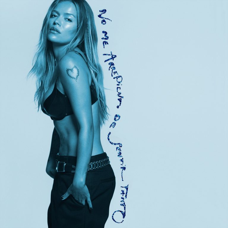 Official blue cover art for Karol G new album No Me Arrepiento de Sentir Tanto.